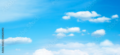 Sunny background, blue sky with white clouds 
