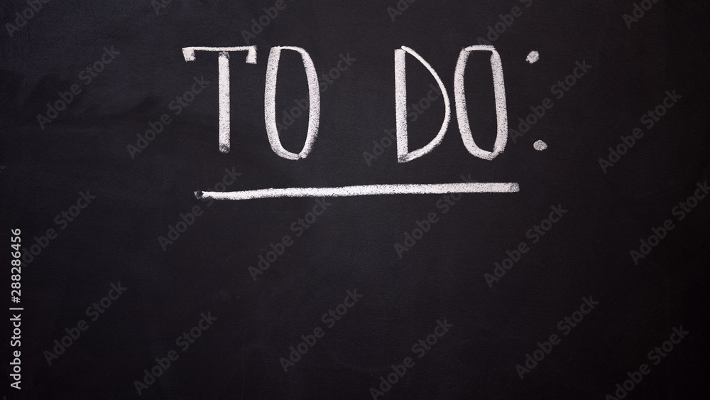 Obraz premium To do written on blackboard, scheduling time, necessary work, time management