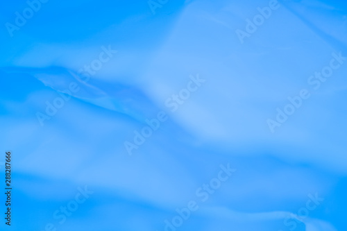 Blue paper layers. Defocused water design. Abstract art background. Empty space.