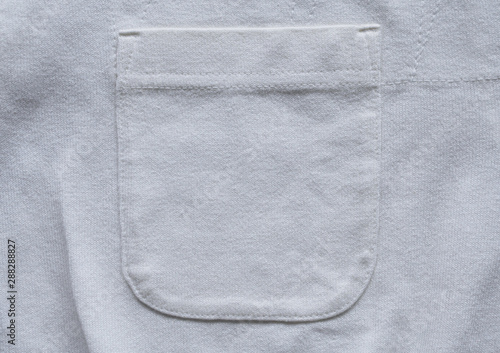 closeup pocket on white cotton shirt