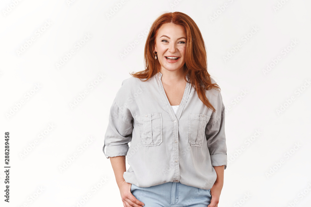 Elegant stylish pretty middle-aged female redhead wearing trendy blouse joyfully chatting smiling toothy entertained lively conversation girlfriends arrange small party nice relaxing atmosphere Elegant stylish pretty middle-aged female redhead wearing trendy blouse joyfully chatting smiling toothy entertained lively conversation girlfriends arrange small party nice relaxing atmosphere