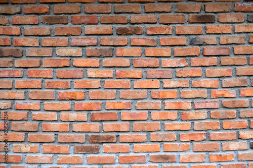 old red brick wall exterior texture background.