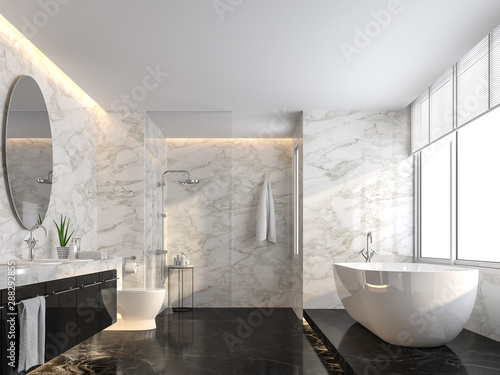 Luxury bathroom with black marble floor and white marble wall 3d render,The room has a clear glass shower partition,There are large windows natural light shining into the room. © onzon