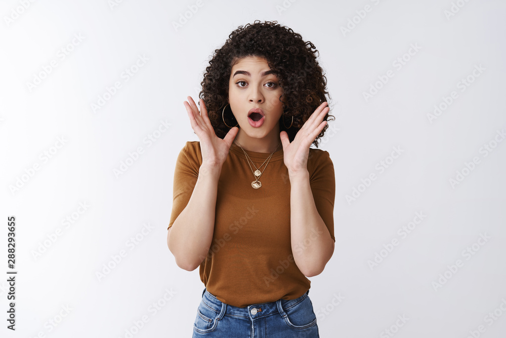 Wait sec what. Shocked impressed speechless young good-looking girl receive unexpected promosion look surprised drop jaw waving hands worried thrilled standing stunned amazed white background Wait sec what. Shocked impressed speechless young good-looking girl receive unexpected promosion look surprised drop jaw waving hands worried thrilled standing stunned amazed white background