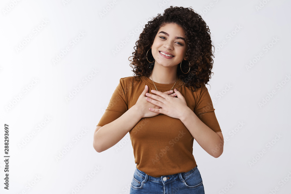 © Cookie Studio - Girl feel grateful thanks bottom heart. Attractive cheerful curly-haired modern young woman hold hands chest thankful smiling pleased like touching cute gift standing white background appreciate © Cookie Studio - Girl feel grateful thanks bottom heart. Attractive cheerful curly-haired modern young woman hold hands chest thankful smiling pleased like touching cute gift standing white background appreciate