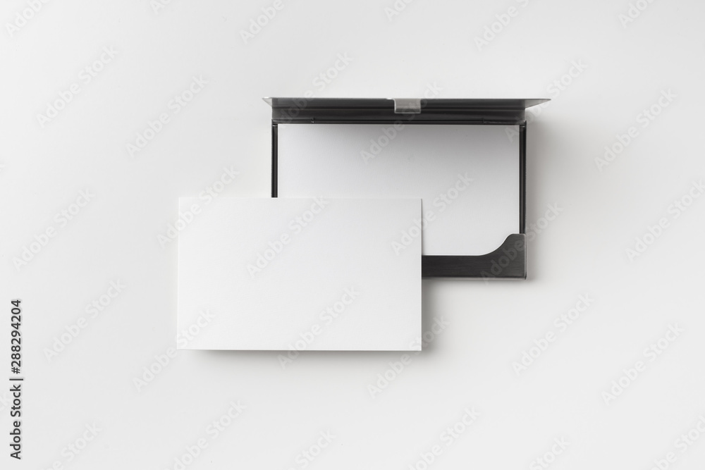 top view of business card with case on white top view of business card with case on white