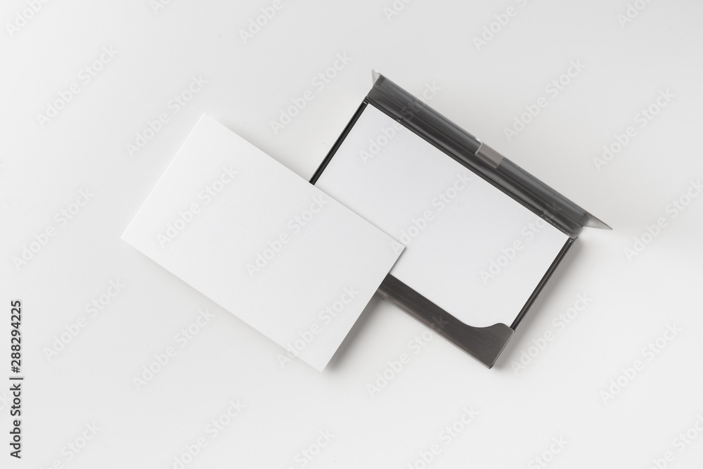 top view of business card with case on white top view of business card with case on white