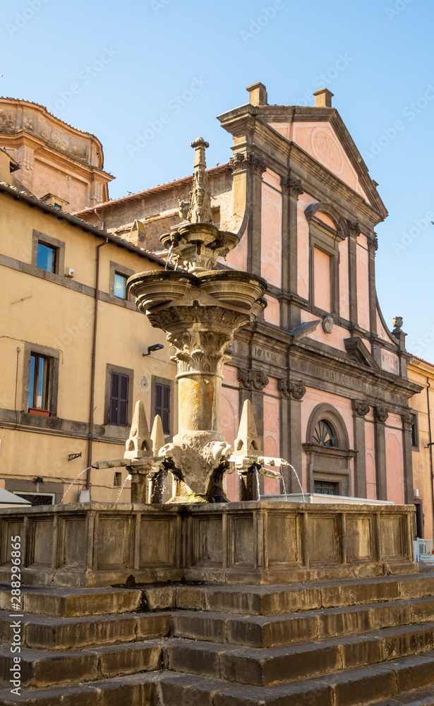 Large square fountain in the old town of Viterbo, Italy