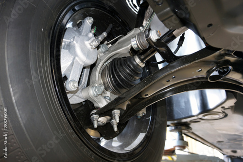The structure of the modern car. Elements of front suspension. Control arm. Tie rod. Drive unit. Wheel bearing housing. Shock absorber. 
