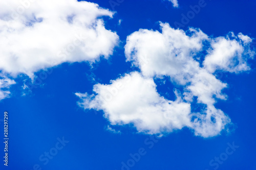Clouds and blue sky background with copy space