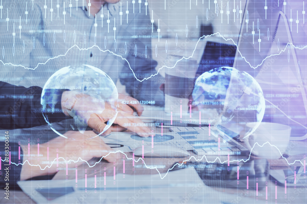 Multi exposure of chart with man typing on computer in office on background. Concept of hard work. Multi exposure of chart with man typing on computer in office on background. Concept of hard work.