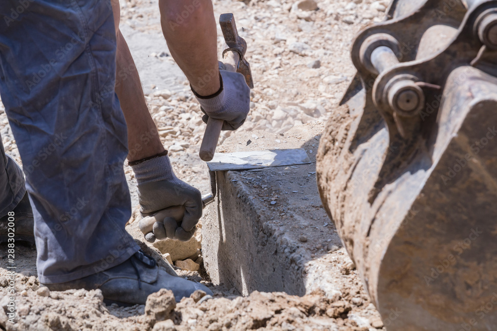 Heavy work for a construction worker on the site. Heavy work for a construction worker on the site.