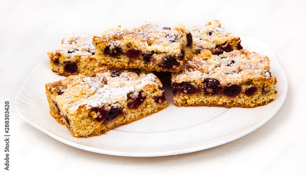 Slice of cherry Crumb cake on a dessert plate Slice of cherry Crumb cake on a dessert plate