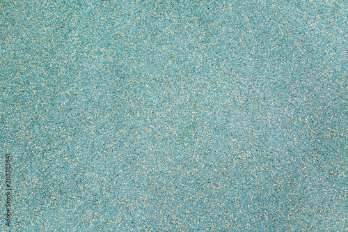 Background of rubberized coating used on children's and sports grounds white and blue. Backgrounds texture design.