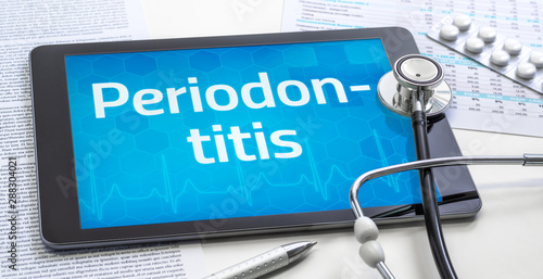 Photos The word Periodontitis on the display of a tablet