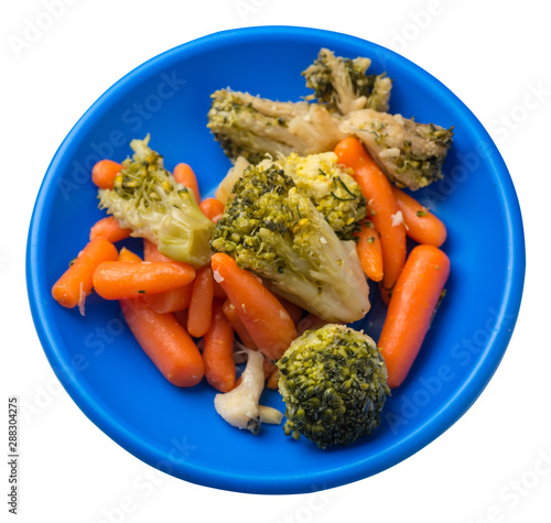 provencal vegetables on a plate.grilled vegetables on a plate isolated on white background.broccoli and carrots on a plate top view.healthy food