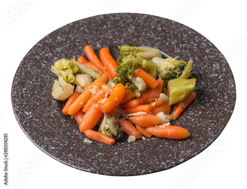 provencal vegetables on a plate.grilled vegetables on a plate isolated on white background.broccoli and carrots on a plate top view.healthy food