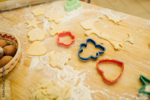 The dough cuted out by cookie cutters, nobody