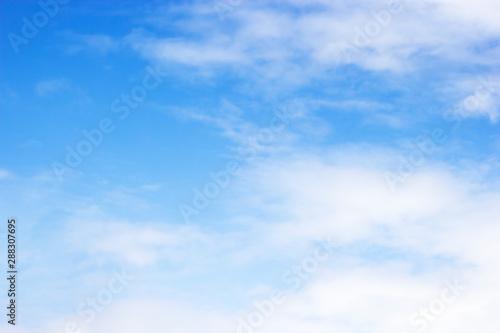 Fantastic soft white clouds against blue sky and copy space.