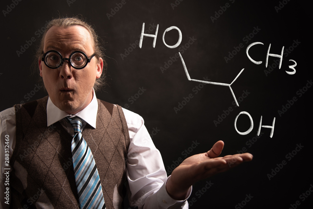 Professor presenting handdrawn chemical formula of propylene glycol -1,2 Professor presenting handdrawn chemical formula of propylene glycol -1,2