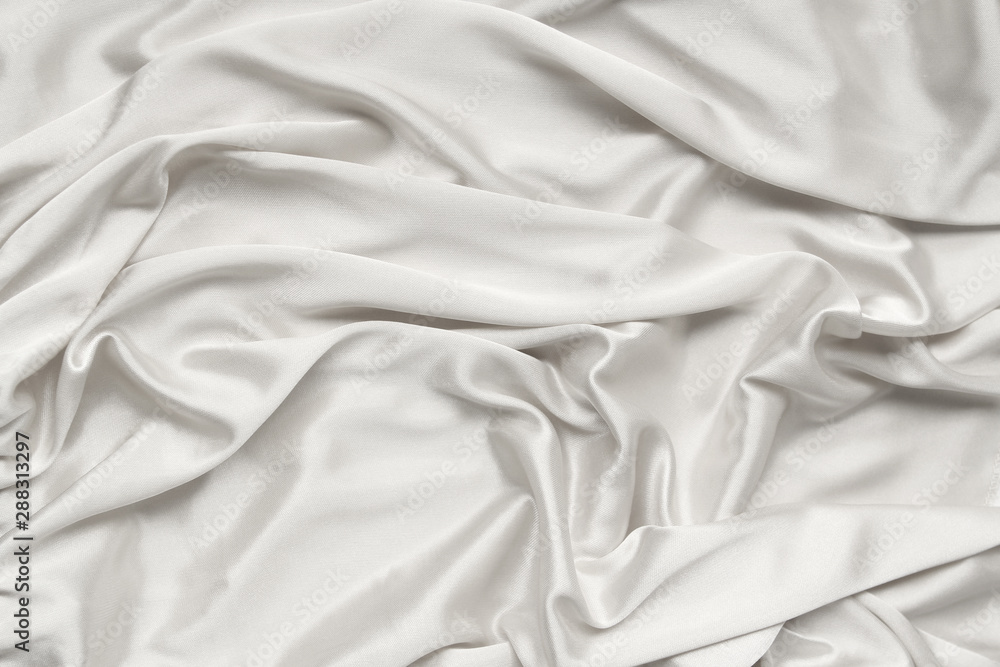 Obraz premium silk knitted fabric softly draped with small folds, texture, background, form for postcard, copy space