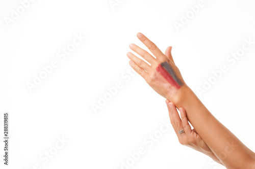 Cosmetic powder on woman hand isolated on white background. © Александр Травин