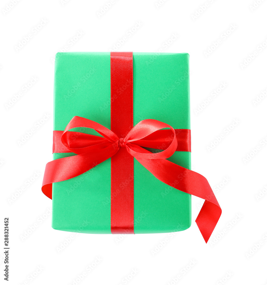 Christmas gift box decorated with ribbon bow on white background, top view Christmas gift box decorated with ribbon bow on white background, top view
