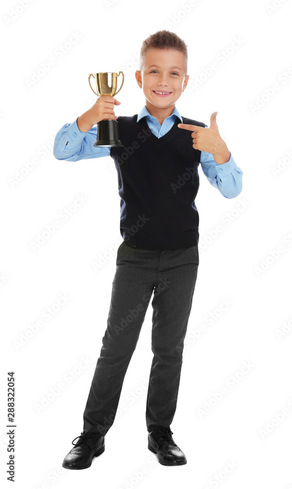 Happy boy in school uniform with golden winning cup isolated on white Happy boy in school uniform with golden winning cup isolated on white