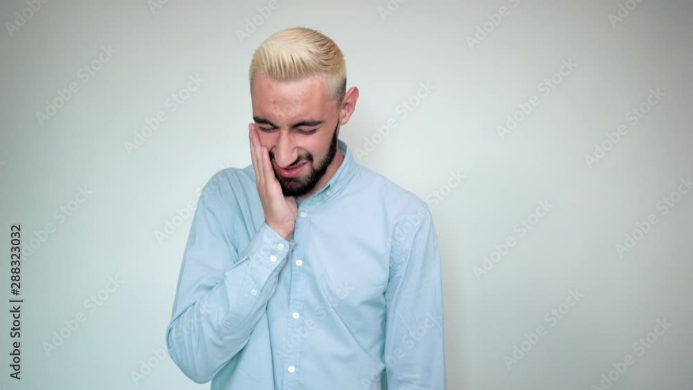 man with blond hair, black beard over isolated white background shows emotions man with blond hair, black beard over isolated white background shows emotions