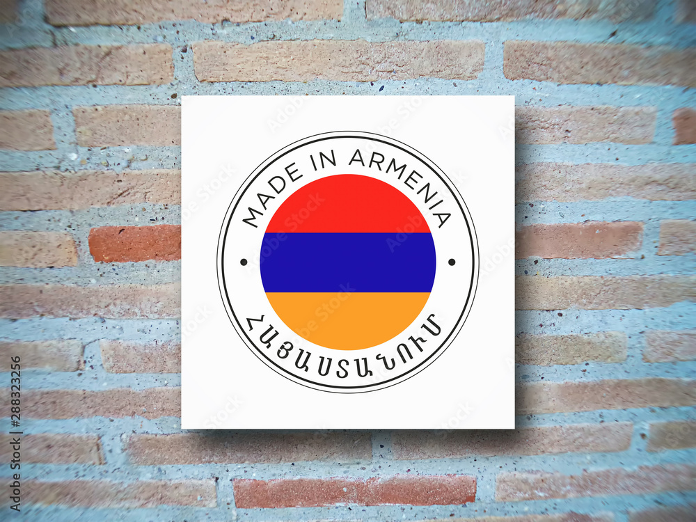 Made in Armenia icon on a brick background.