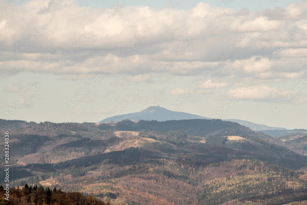 Lysa hora hill in Moravskoslezske Beskydy mountains from Kecka hill in Sulovske skaly mountains in Slovakia duting autumn