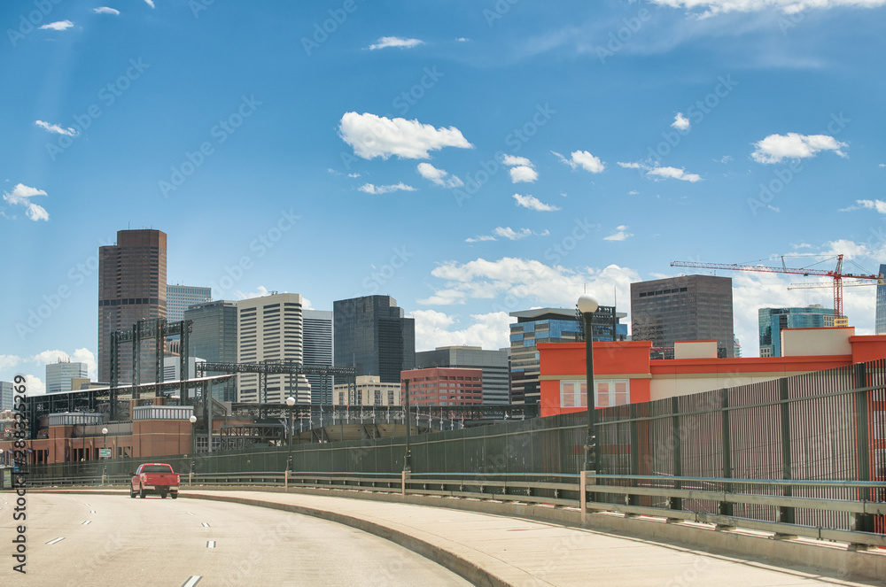 Denver skyline as seen from main road, Colorado. Arriving in the city Denver skyline as seen from main road, Colorado. Arriving in the city