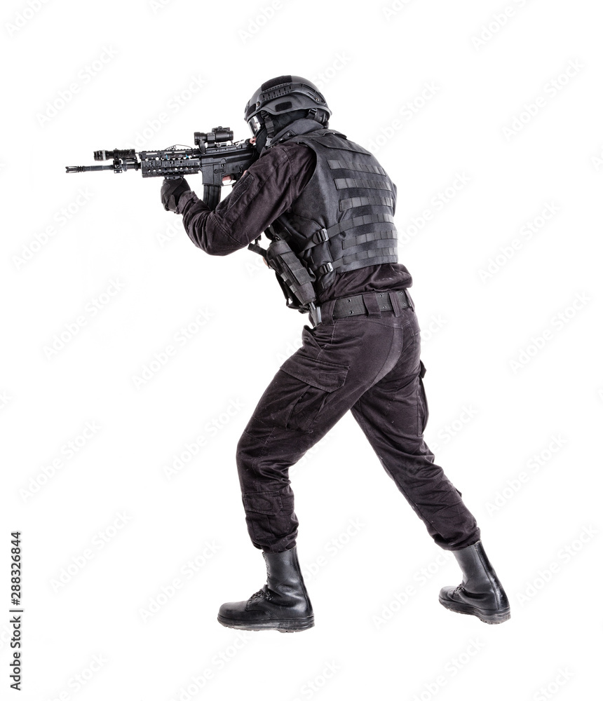 Police special forces shooter sneaking with rifle Police special forces shooter sneaking with rifle