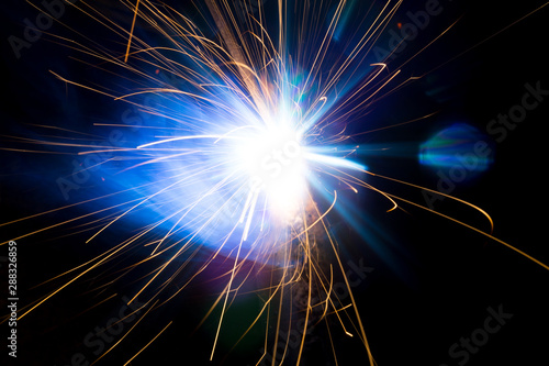 Welding sparks and smoke worker robot