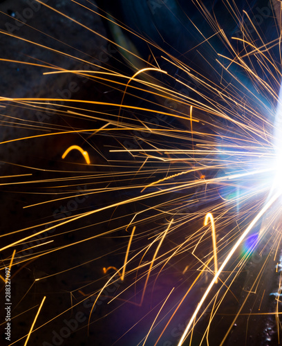 Welding sparks and smoke worker robot