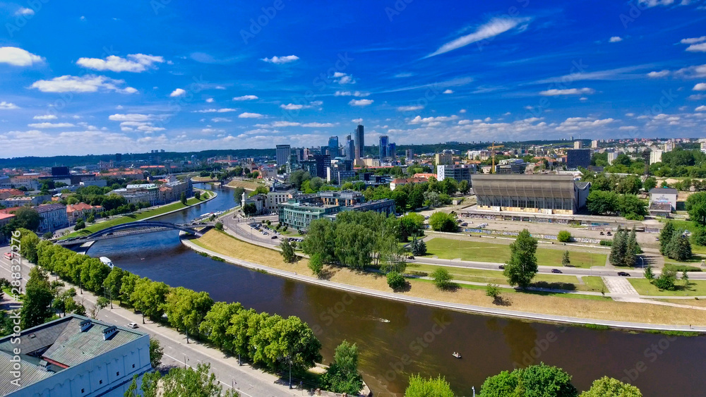 Aerial view of Vilnius with Neris river and modern city skyline, Lithuania.
