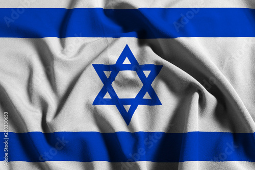 National flag of Israel on a waving cotton texture background