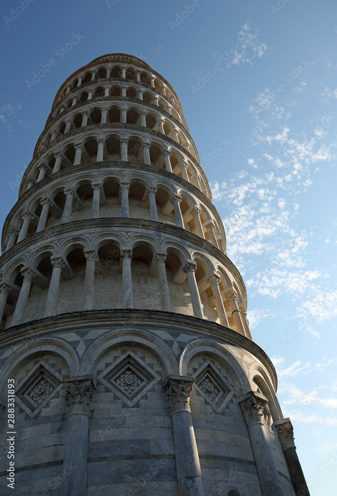 Leaning Tower of Pisa with bluwe sky and more clouds