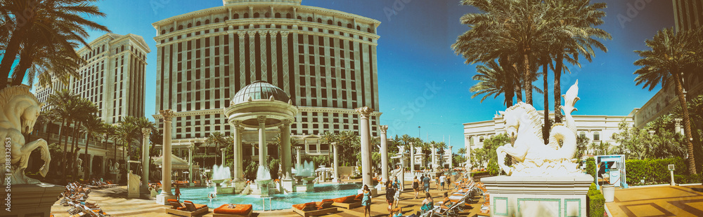 LAS VEGAS - JUNE 27, 2019: Panoramic view of Caesar Palace pools. It is a famous tourist attraction - obrazy, fototapety, plakaty 