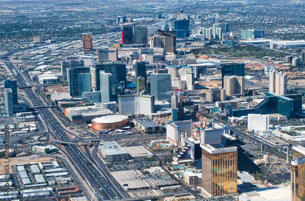 Las Vegas aerial view from aircraft. The Strip skyline and casinos on a summer day, Nevada, USA
