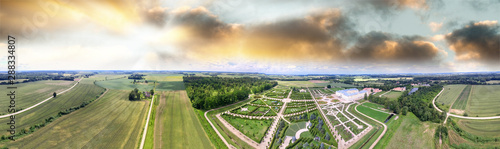 Panoramic sunset aerial view of Rundale Castle in Latvia. Building and gardens