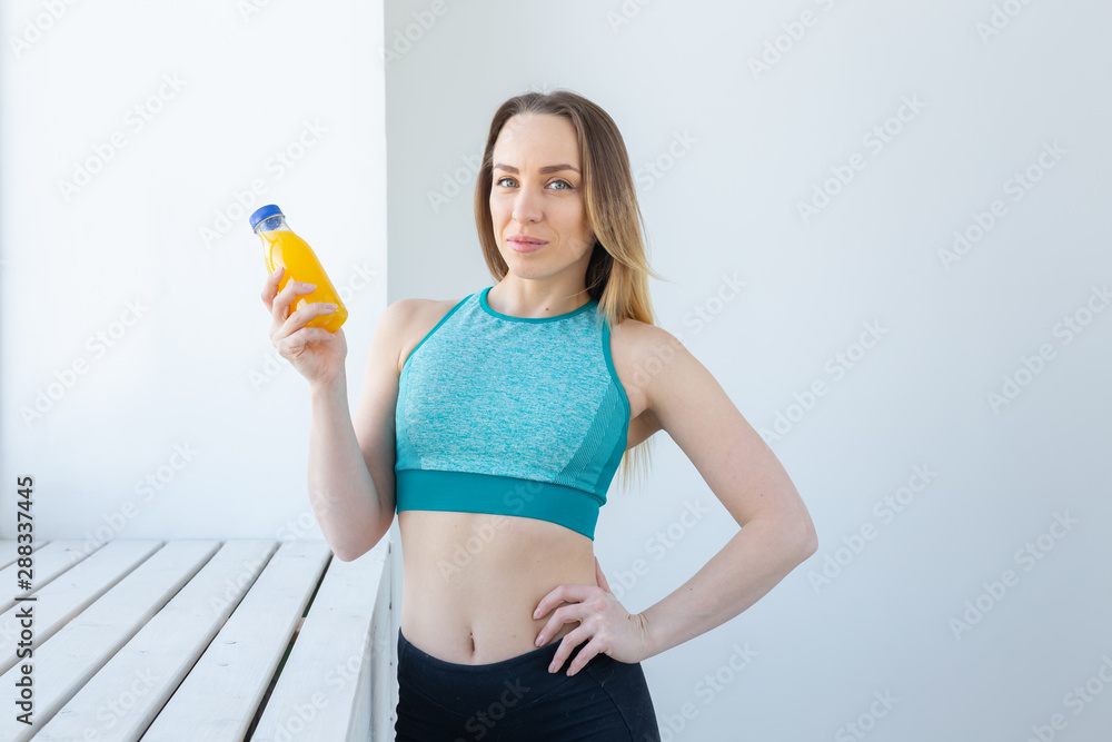 Healthy lifestyle, diet and vitamins - fitness woman with juice. Healthy lifestyle, diet and vitamins - fitness woman with juice.