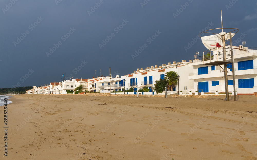 Seafront parallel to the Altafulla beach with its houses facing the Mediterranean Sea. Tarragona