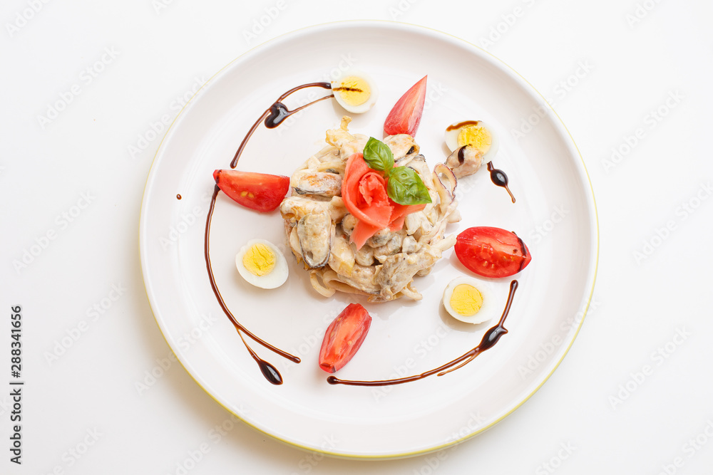seafood salad with a eggs on a white background seafood salad with a eggs on a white background