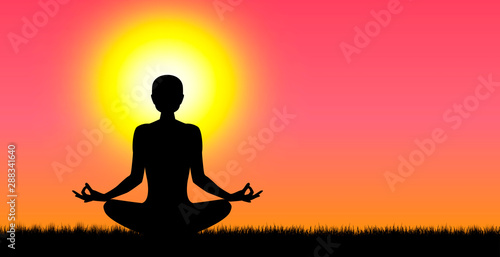 Woman doing yoga at sunset. A woman performs yoga exercises at sunset. Human going yoga
