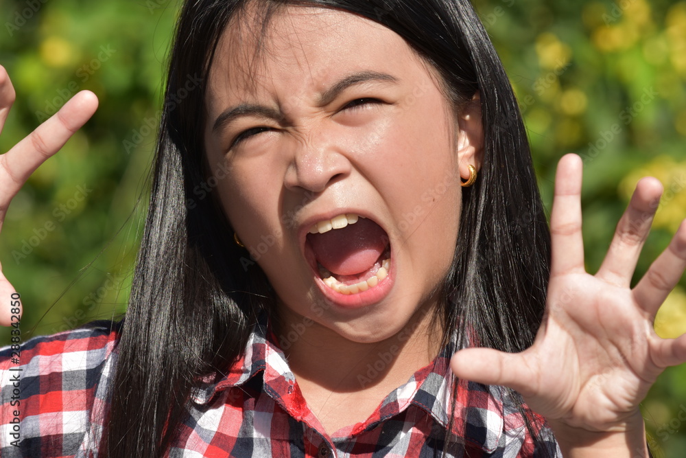 An Intimidating Petite Diverse Female An Intimidating Petite Diverse Female