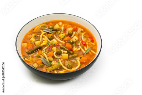 Vegetarian Vegetable Soup Isolated on a white background. Selective focus.