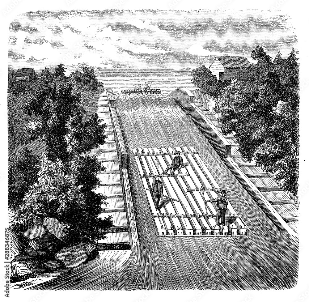 Workers use an assembled raft to pass through a sluice gate controlling