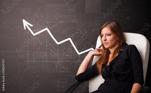 Young person standing with increasing graph concept