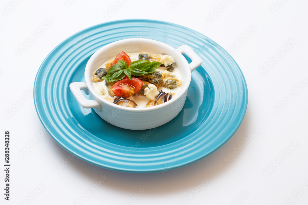 seafood cream soup on a white